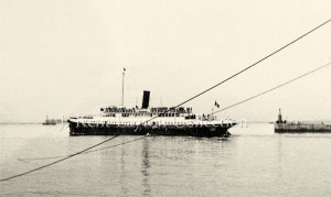 An original photograph of the Nomadic serving as a tender in Cherbourg Harbor. This photograph, which was mixed in with a batch of Cherbourg and Southampton pictures, probably dates to the late 1920's to early 1930's. Because of the dark color of her funnel, it seems possible that the photograph was taken after she was purchased from Cunard-White Star (in 1934) and re-named Ingenieur Minard. (J. Kent Layton Collection)